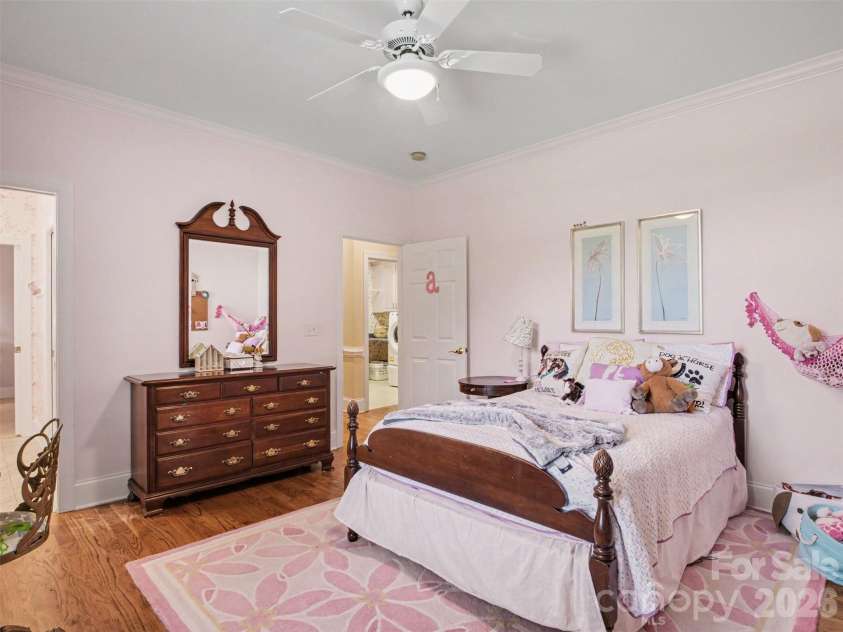 1422 Stone Gate Drive, Shelby, NC 28150.  MLS# CAR4358985, YatesRealty ID 23404. The third bedroom features natural light and hardwood floors.