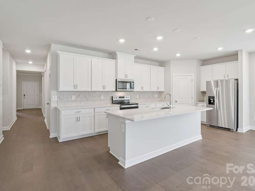 2457 Chartwell Street, Stanley, NC 28164.  MLS# CAR4383773, YatesRealty ID 23405. Photo is not of the actual home, but is an inspirational photo of builder’s model home and may depict options, furnishings, and/or decorator features that are not included