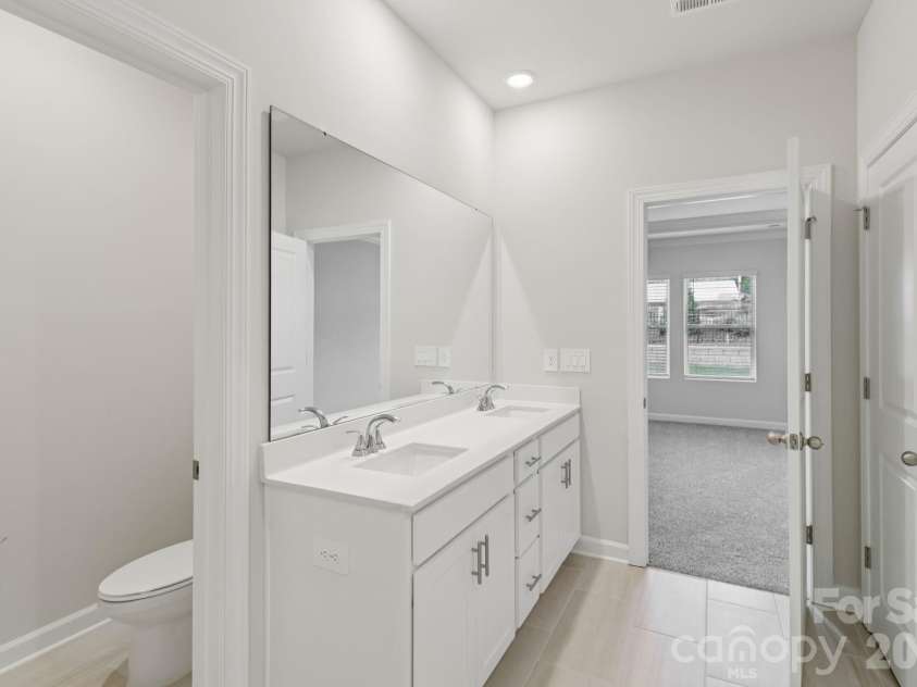 2457 Chartwell Street, Stanley, NC 28164.  MLS# CAR4383773, YatesRealty ID 23405. Photo is not of the actual home, but is an inspirational photo of builder’s model home and may depict options, furnishings, and/or decorator features that are not included