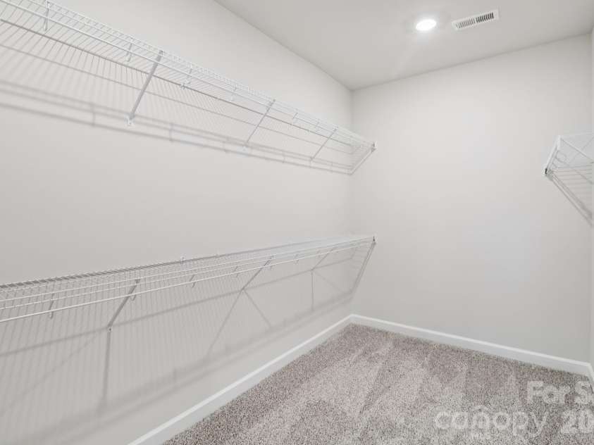 2457 Chartwell Street, Stanley, NC 28164.  MLS# CAR4383773, YatesRealty ID 23405. Photo is not of the actual home, but is an inspirational photo of builder’s model home and may depict options, furnishings, and/or decorator features that are not included