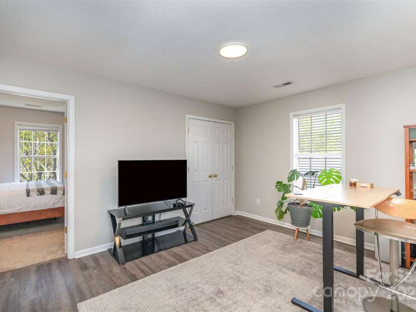 1227 Triece Lane, Charlotte, NC 28215.  MLS# CAR4238144, YatesRealty ID 23406. Family room that can be converted to 4th bedroom