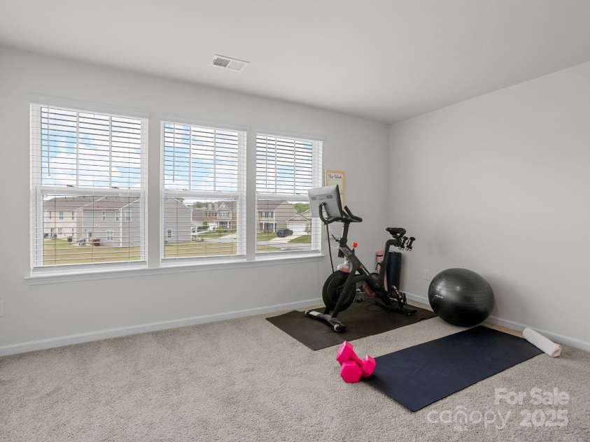 7007 Manse Court, Boiling Springs, SC 29316.  MLS# CAR4260062, YatesRealty ID 23409. Another oversized bedroom that will make a great workout area.