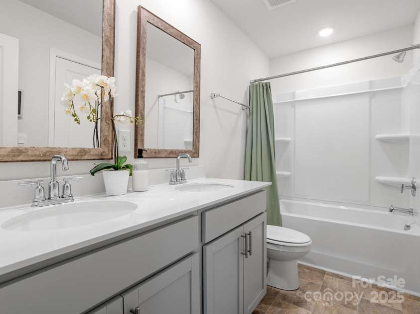 7007 Manse Court, Boiling Springs, SC 29316.  MLS# CAR4260062, YatesRealty ID 23409. Bathroom # 2 with double vanity sink