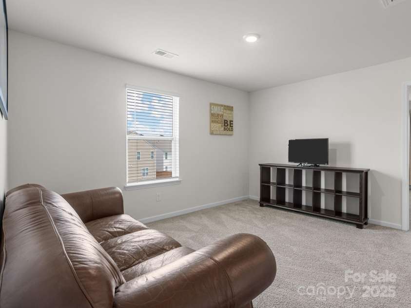 7007 Manse Court, Boiling Springs, SC 29316.  MLS# CAR4260062, YatesRealty ID 23409. Makes a great theater room or play room.