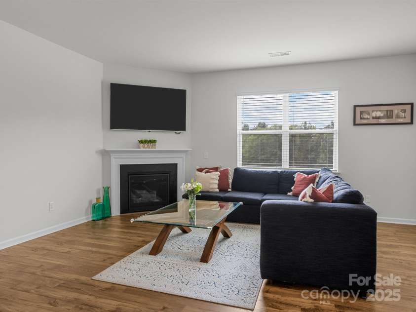 7007 Manse Court, Boiling Springs, SC 29316.  MLS# CAR4260062, YatesRealty ID 23409. Sit back and enjoy your spacious family room.