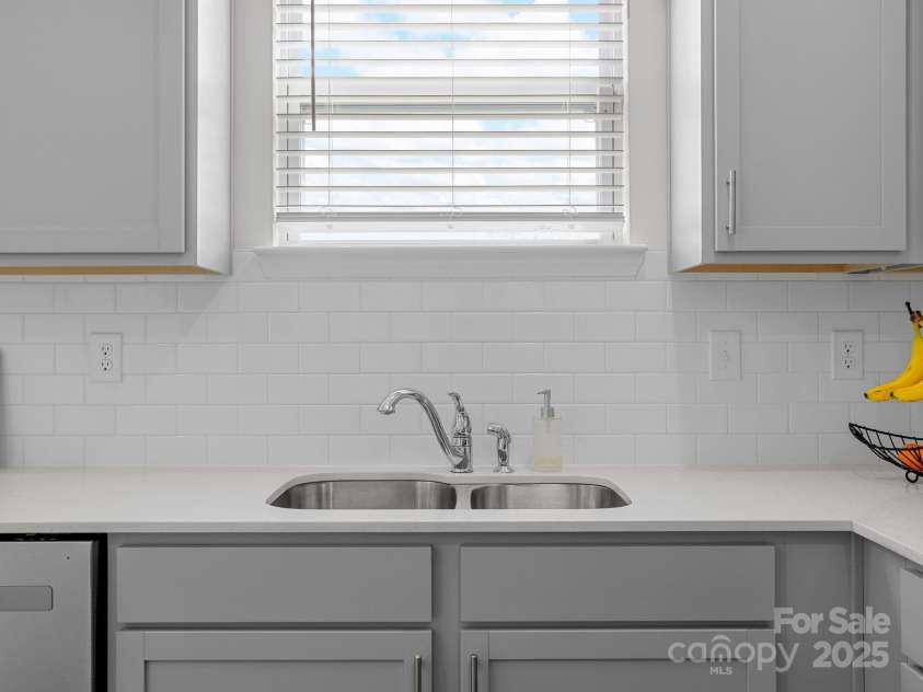 7007 Manse Court, Boiling Springs, SC 29316.  MLS# CAR4260062, YatesRealty ID 23409. Wash the dishes and look outside at your spacious backyard