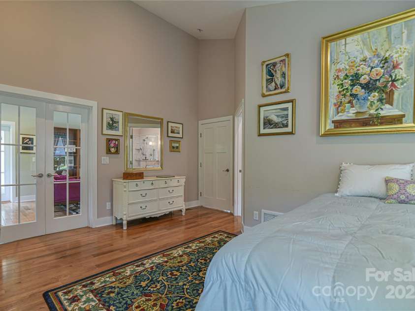 63 Greenridge Road, Weaverville, NC 28787.  MLS# CAR4268175, YatesRealty ID 23413. Bedroom 1 accessed via centrally located family/flex room.