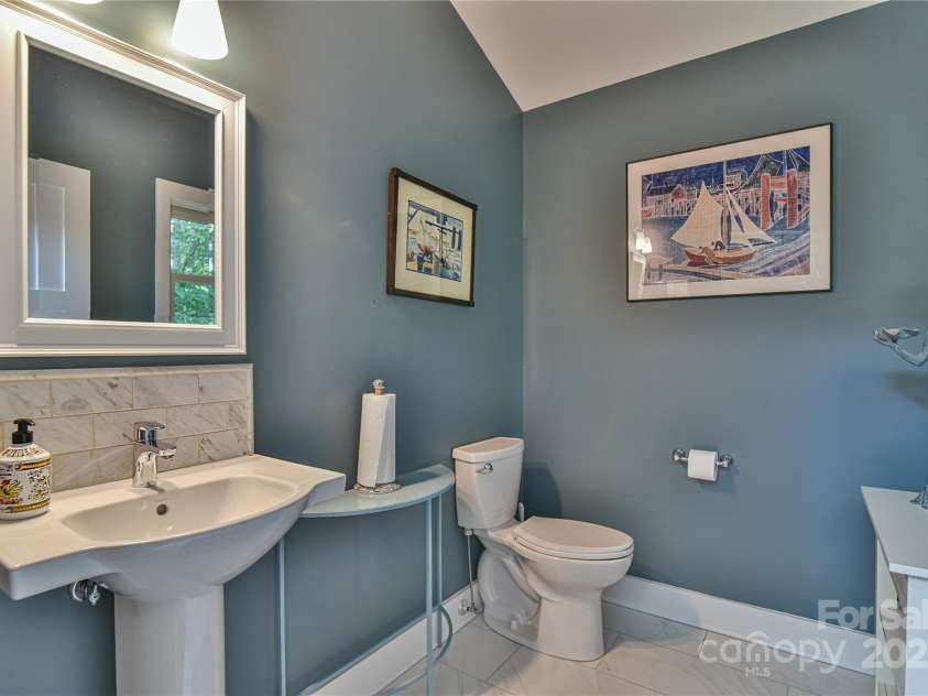 63 Greenridge Road, Weaverville, NC 28787.  MLS# CAR4268175, YatesRealty ID 23413. Charming half bath for your guests.