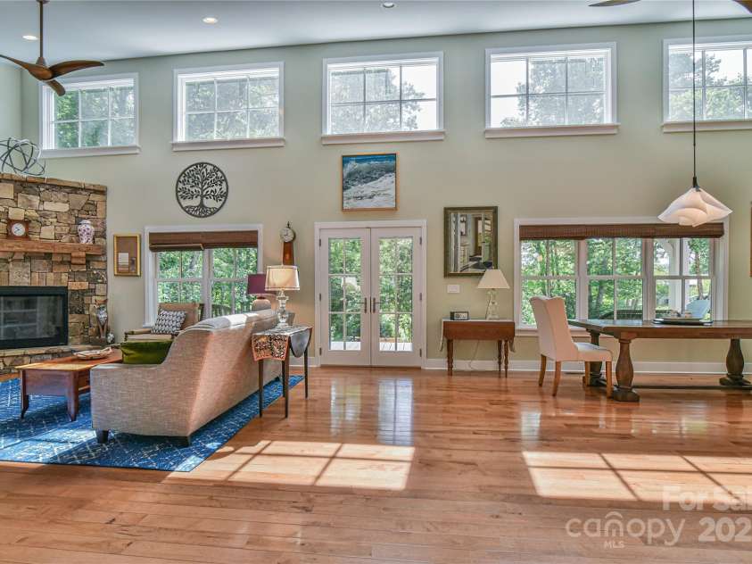 63 Greenridge Road, Weaverville, NC 28787.  MLS# CAR4268175, YatesRealty ID 23413. Door from living area opens onto the large front porch.