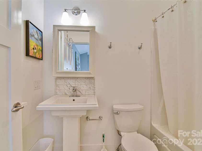 63 Greenridge Road, Weaverville, NC 28787.  MLS# CAR4268175, YatesRealty ID 23413. En-suite bath 2 includes a bathtub for soaking.