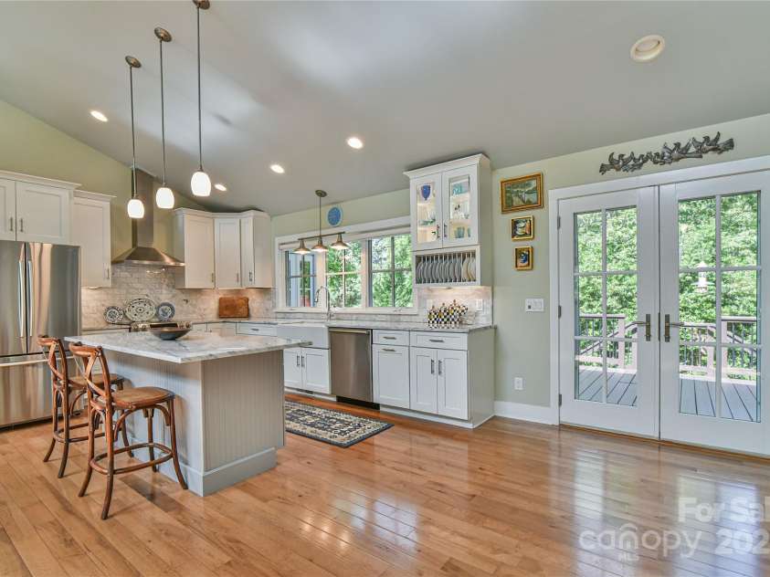 63 Greenridge Road, Weaverville, NC 28787.  MLS# CAR4268175, YatesRealty ID 23413. Plan to grill on the back deck? No problem - easy access back to the kitchen!