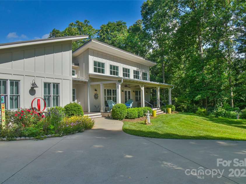 63 Greenridge Road, Weaverville, NC 28787.  MLS# CAR4268175, YatesRealty ID 23413. Tasteful landscaping and curb appeal.