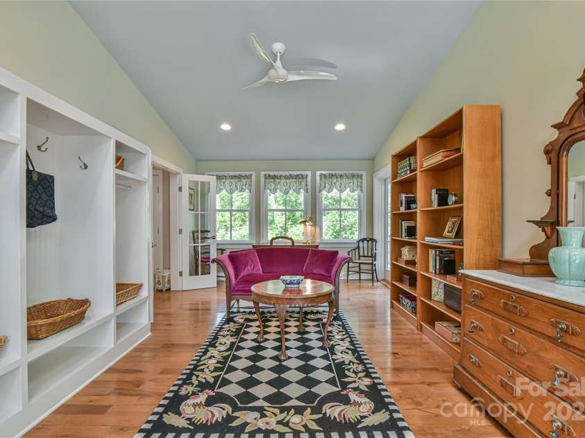 63 Greenridge Road, Weaverville, NC 28787.  MLS# CAR4268175, YatesRealty ID 23413. Upon entering, you'll appreciate the thoughtful design of the space, centrally connected to bedrooms and living areas.