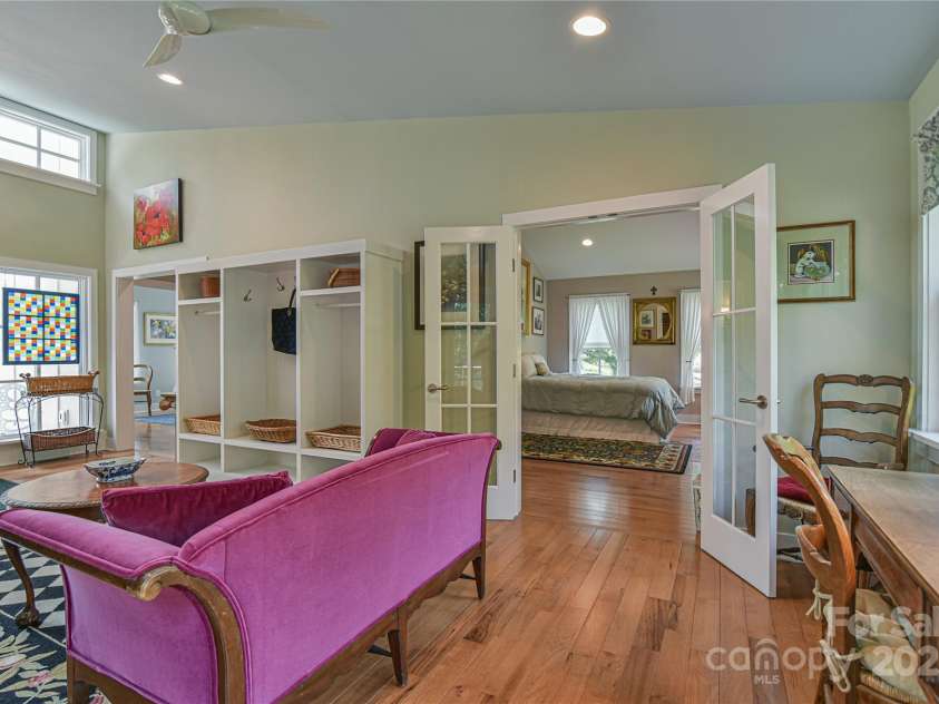 63 Greenridge Road, Weaverville, NC 28787.  MLS# CAR4268175, YatesRealty ID 23413. View into one of the bedrooms from the centrally located family / flex room.