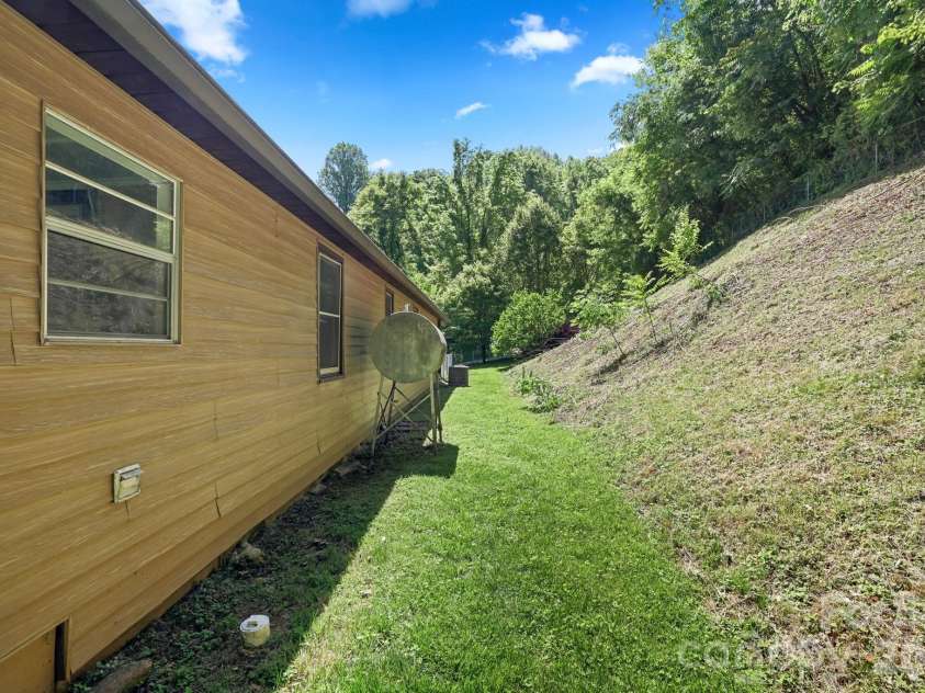 270 Slim Dillard Road, Sylva, NC 28779.  MLS# CAR4383810, YatesRealty ID 23415. 