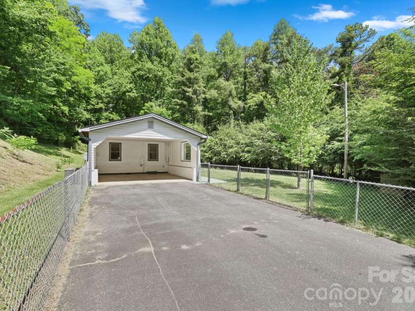 270 Slim Dillard Road, Sylva, NC 28779.  MLS# CAR4383810, YatesRealty ID 23415. 