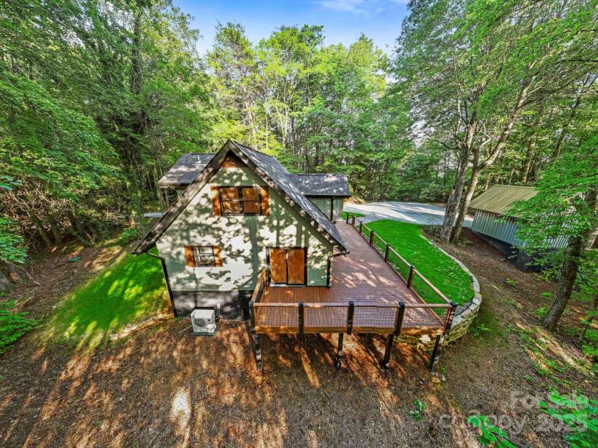 327 Flat Ridge Drive, Lake Toxaway, NC 28774.  MLS# CAR4270374, YatesRealty ID 23416. Back house view