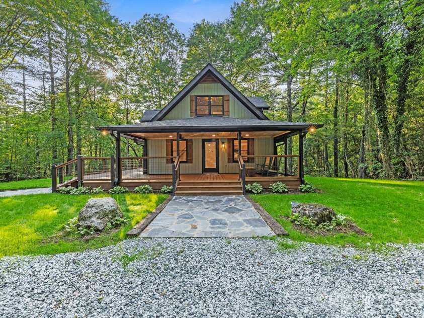 327 Flat Ridge Drive, Lake Toxaway, NC 28774.  MLS# CAR4270374, YatesRealty ID 23416. Flag stone pathway entrance