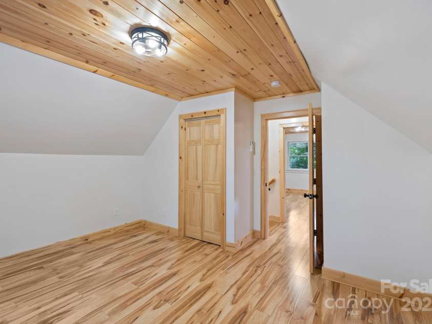 327 Flat Ridge Drive, Lake Toxaway, NC 28774.  MLS# CAR4270374, YatesRealty ID 23416. Upper bedroom or office