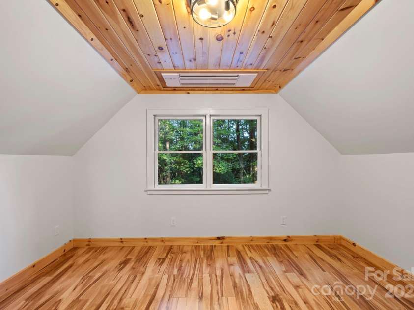 327 Flat Ridge Drive, Lake Toxaway, NC 28774.  MLS# CAR4270374, YatesRealty ID 23416. Upper bedroom or office