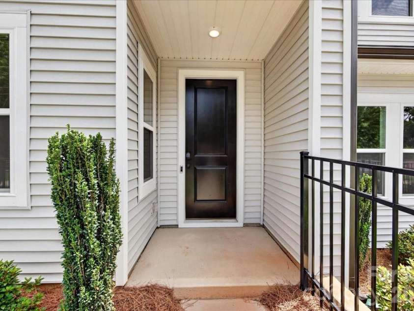 6319 Haller Street, Charlotte, NC 28227.  MLS# CAR4383871, YatesRealty ID 23417. Covered front door