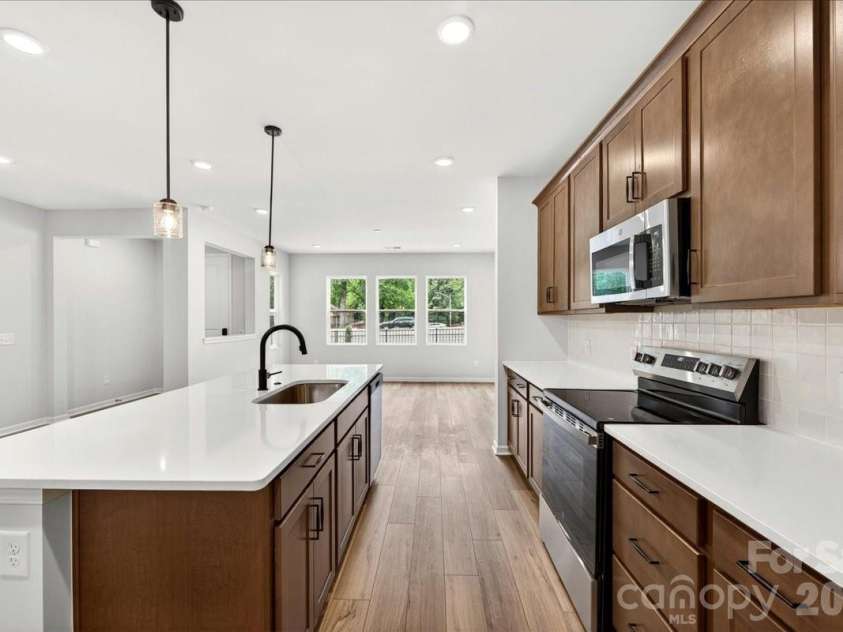 6319 Haller Street, Charlotte, NC 28227.  MLS# CAR4383871, YatesRealty ID 23417. Kitchen with electric range