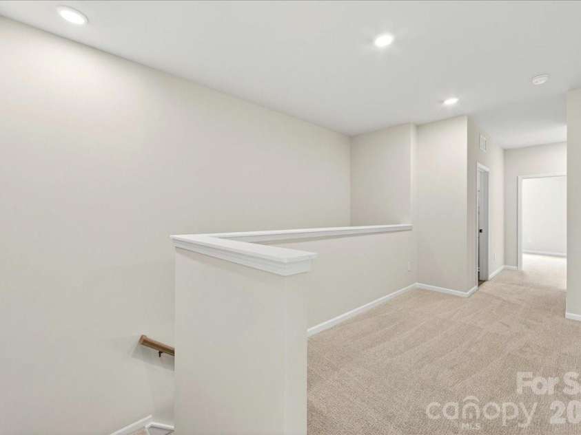 6319 Haller Street, Charlotte, NC 28227.  MLS# CAR4383871, YatesRealty ID 23417. Second floor landing