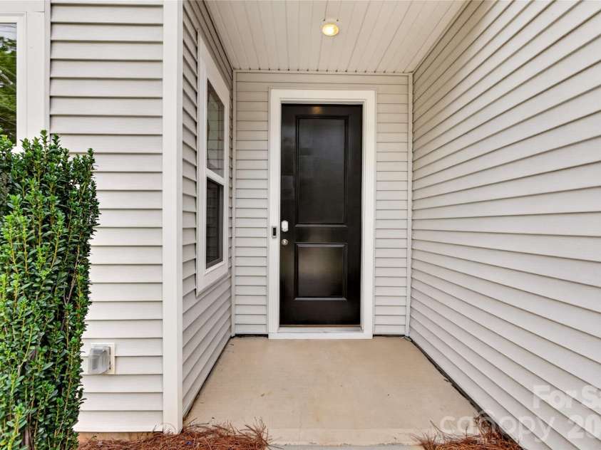 6315 Haller Street, Charlotte, NC 28227.  MLS# CAR4383884, YatesRealty ID 23418. Covered front door