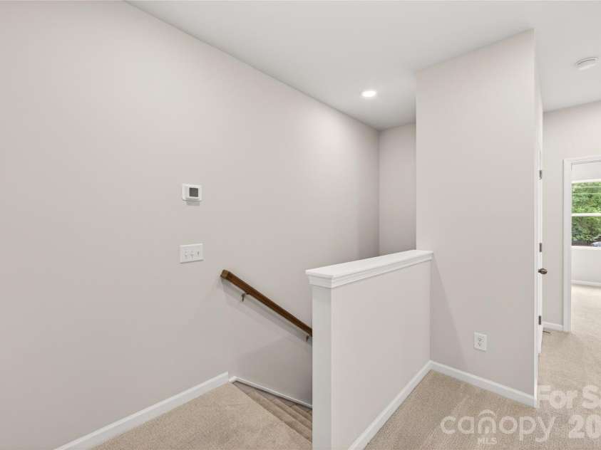 6315 Haller Street, Charlotte, NC 28227.  MLS# CAR4383884, YatesRealty ID 23418. Second floor landing