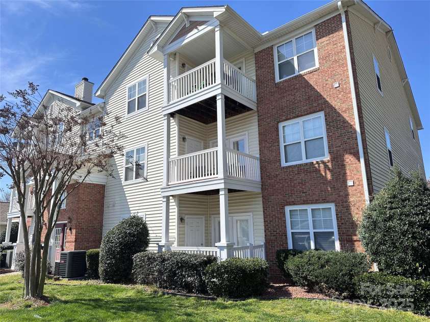 10720 Hill Point Court, Charlotte, NC 28262.  MLS# CAR4243076, YatesRealty ID 23419. Fist Floor Condo with Patio