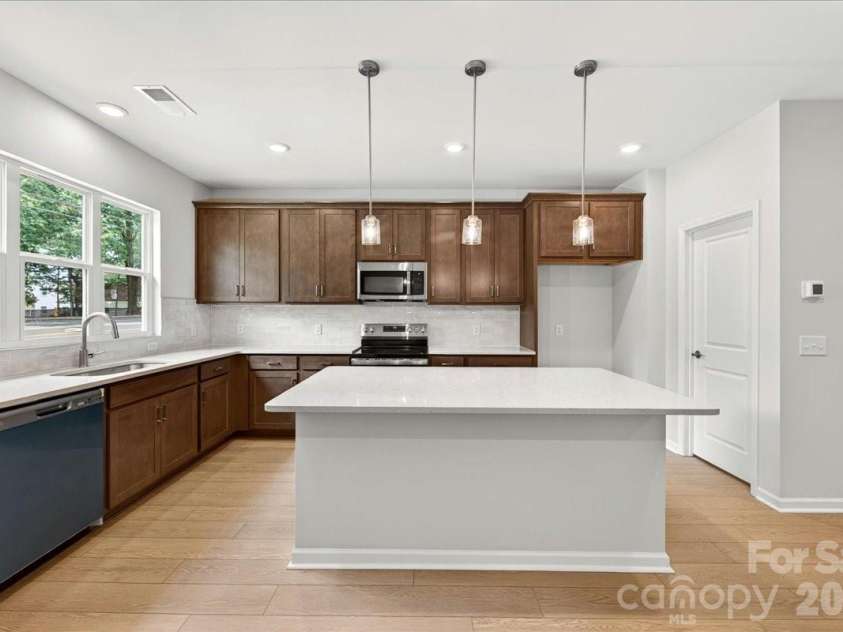 6323 Haller Street, Charlotte, NC 28227.  MLS# CAR4383894, YatesRealty ID 23419. Light filled kitchen