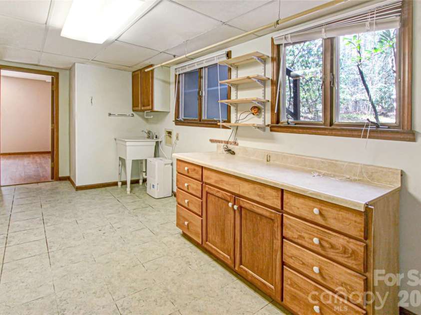 540 Chickadee Lane, Brevard, NC 28712.  MLS# CAR4363992, YatesRealty ID 23422. Basement - Laundry/Utility/Hobby
