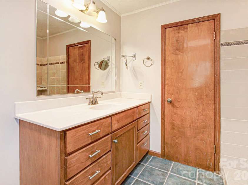 540 Chickadee Lane, Brevard, NC 28712.  MLS# CAR4363992, YatesRealty ID 23422. Primary Bath