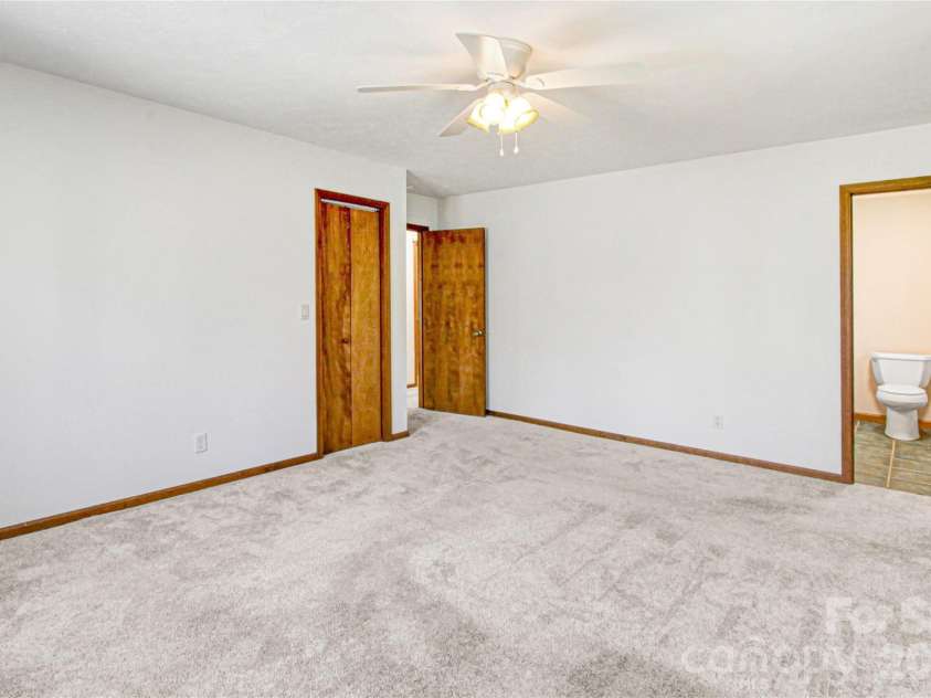 540 Chickadee Lane, Brevard, NC 28712.  MLS# CAR4363992, YatesRealty ID 23422. Primary Bedroom