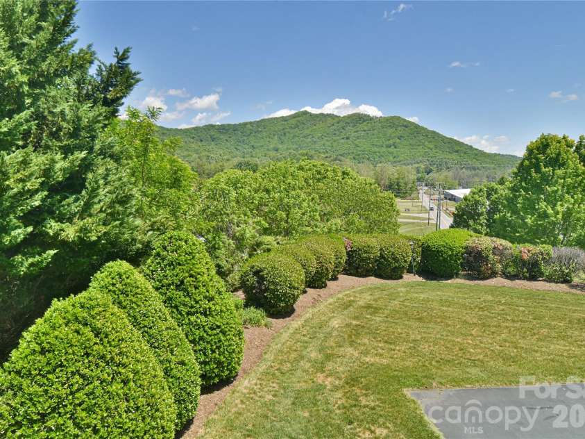 11 Outlook Circle, Swannanoa, NC 28778.  MLS# CAR4380390, YatesRealty ID 23426. Enjoy privacy and year-round views from this tucked-in setting.
