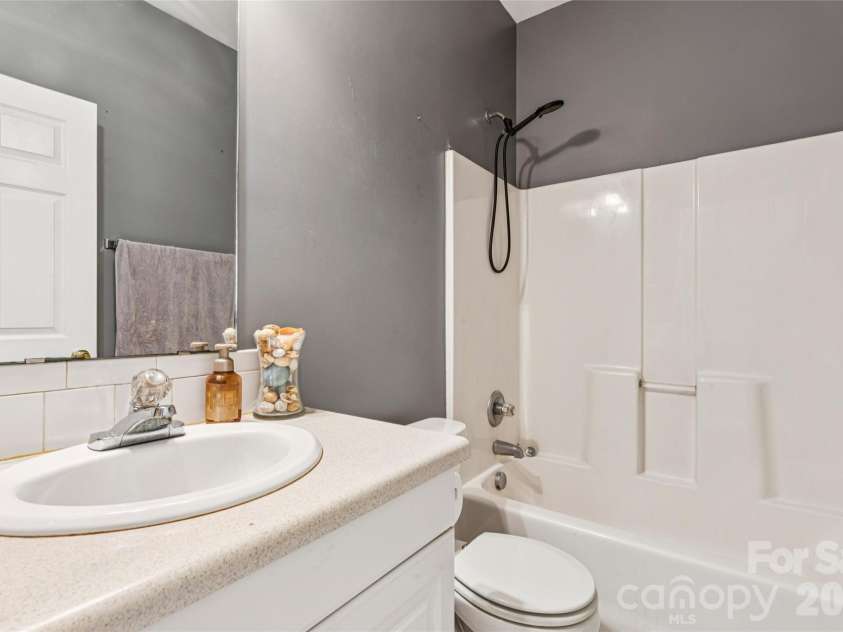 2903 Shady Lane Avenue, Concord, NC 28027.  MLS# CAR4376194, YatesRealty ID 23427. Hall bathroom