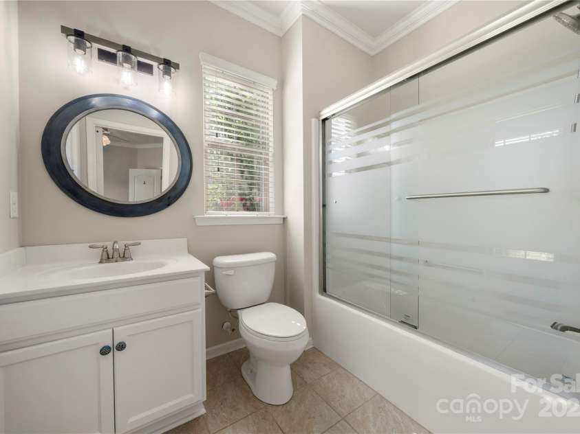 13929 Tilesford Lane, Huntersville, NC 28078.  MLS# CAR4199840, YatesRealty ID 23428. Main level guest suite