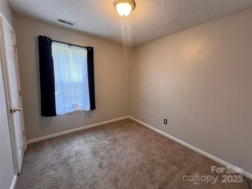 5523 Stone Bluff Court, Charlotte, NC 28214.  MLS# CAR4261273, YatesRealty ID 23429. Bedroom 2