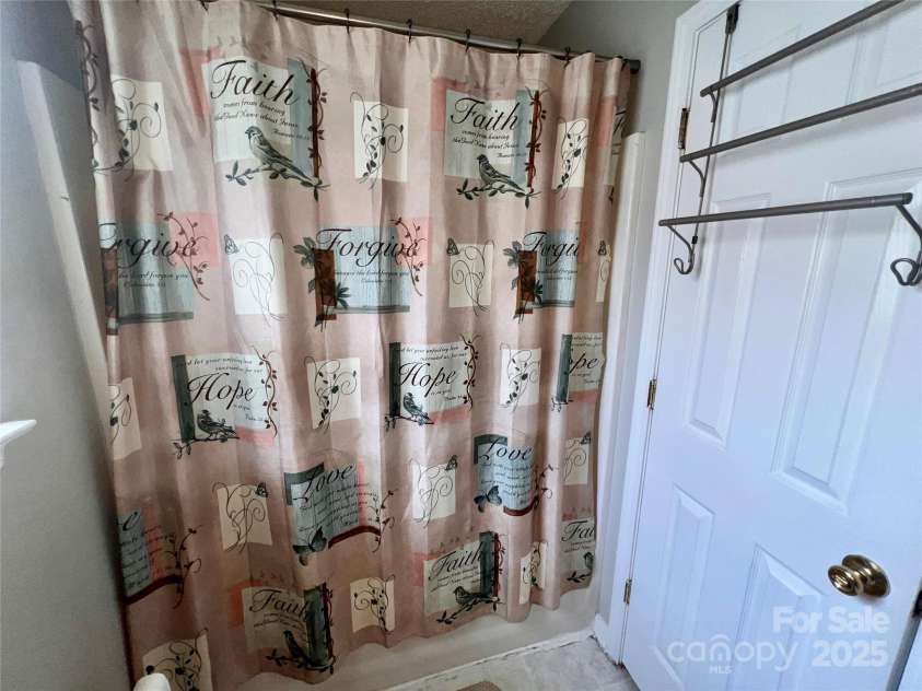 5523 Stone Bluff Court, Charlotte, NC 28214.  MLS# CAR4261273, YatesRealty ID 23429. Primary bathroom