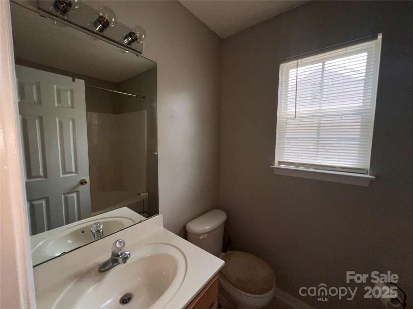 5523 Stone Bluff Court, Charlotte, NC 28214.  MLS# CAR4261273, YatesRealty ID 23429. Primary bathroom