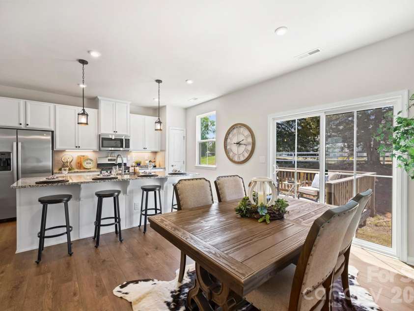 2636 Grantham Place Drive, Fort Mill, SC 29715.  MLS# CAR4374679, YatesRealty ID 23431. Chefs Kitchen Opens to Dining Area