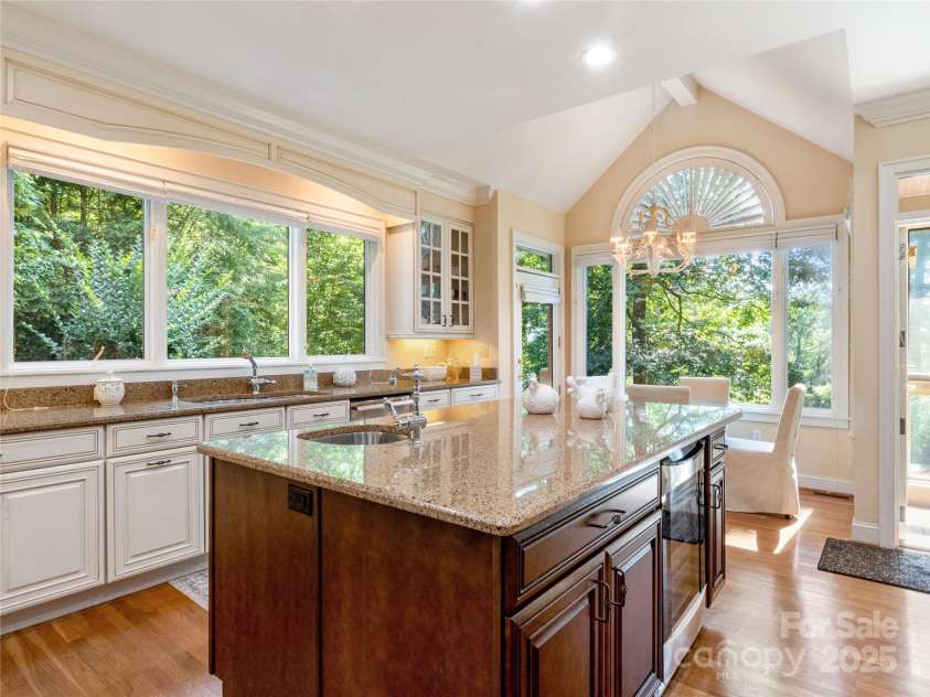 201 Didrikson Way, Hendersonville, NC 28739.  MLS# CAR4275546, YatesRealty ID 23432. Enjoy stunning views from every angle in the kitchen, where oversized windows bring the outdoors in.