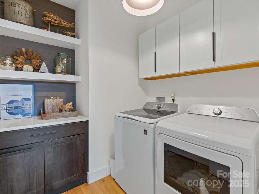 218 Water Leaf Drive, Weaverville, NC 28787.  MLS# CAR4266652, YatesRealty ID 23436. Laundry room by garage