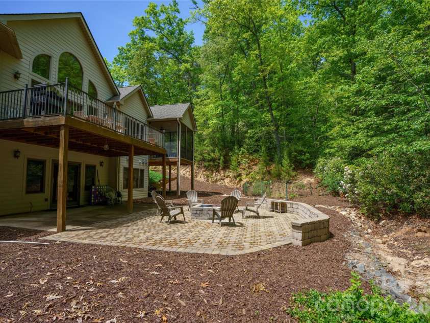176 Hemlock Lane, Lake Lure, NC 28746.  MLS# CAR4374433, YatesRealty ID 23437. Back yard