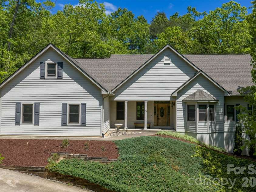176 Hemlock Lane, Lake Lure, NC 28746.  MLS# CAR4374433, YatesRealty ID 23437. Front of home