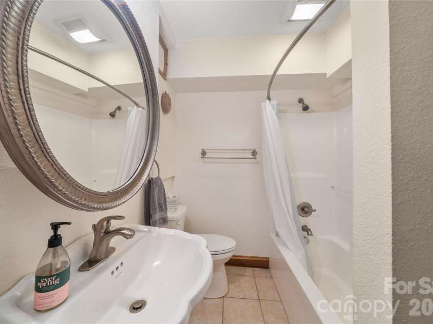 176 Hemlock Lane, Lake Lure, NC 28746.  MLS# CAR4374433, YatesRealty ID 23437. Full bath lower level no 4