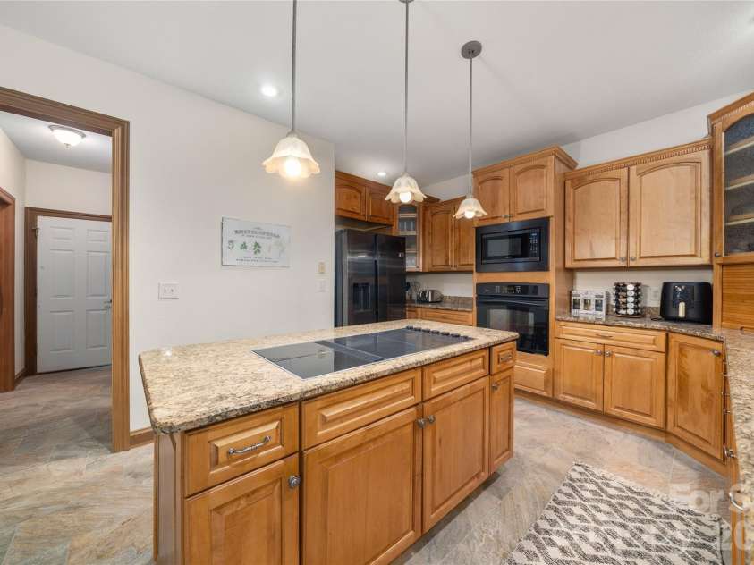 176 Hemlock Lane, Lake Lure, NC 28746.  MLS# CAR4374433, YatesRealty ID 23437. Kitchen main level