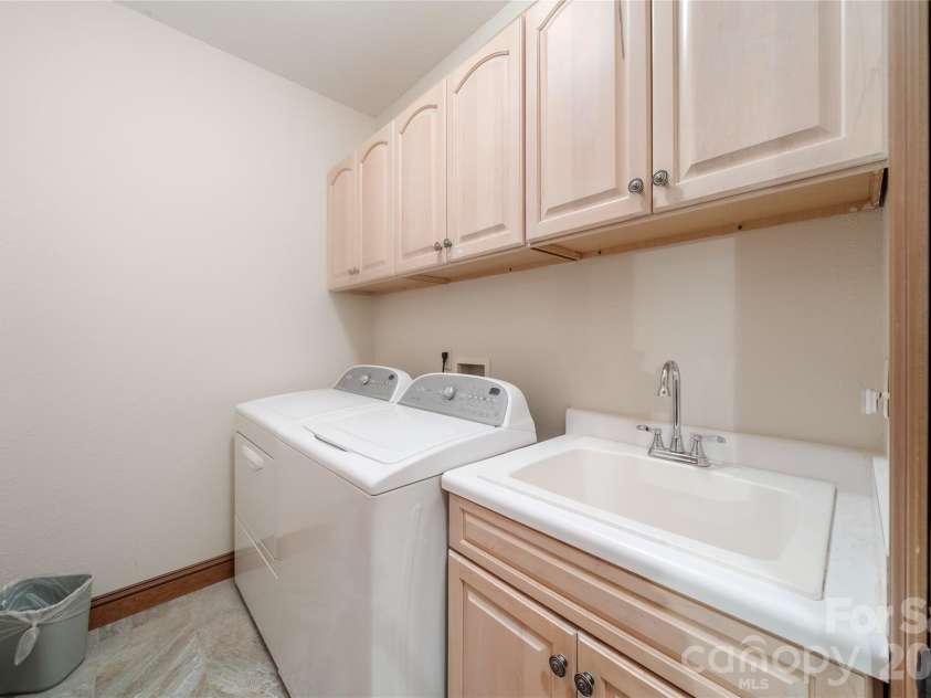 176 Hemlock Lane, Lake Lure, NC 28746.  MLS# CAR4374433, YatesRealty ID 23437. Laundry room main level
