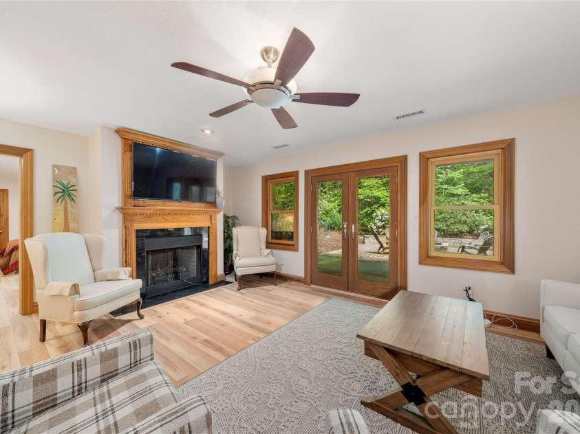 176 Hemlock Lane, Lake Lure, NC 28746.  MLS# CAR4374433, YatesRealty ID 23437. Lower Living room