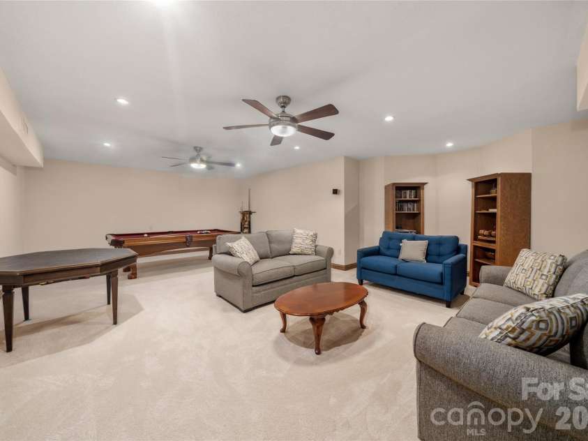 176 Hemlock Lane, Lake Lure, NC 28746.  MLS# CAR4374433, YatesRealty ID 23437. Lower rec room